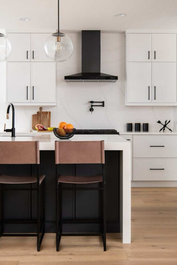 Finished white kitchen cabinetry and island